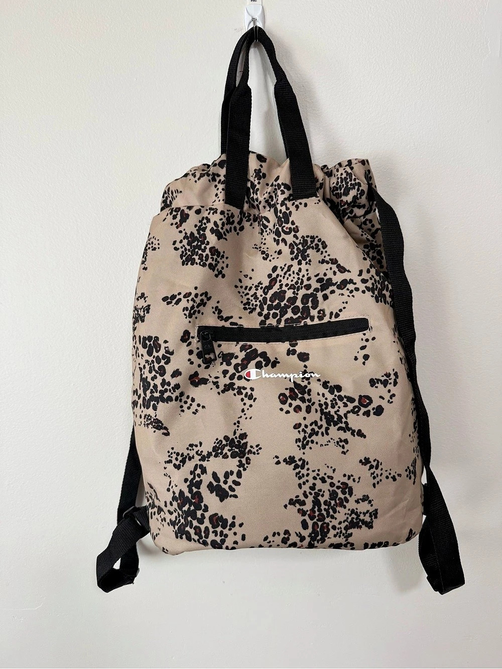 Champion Animal Print Drawstring Backpack in Beige & Black